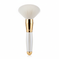 Professional powder setting brush with large fluffy head and white and gold handle