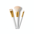 Professional 3-piece eyeshadow brush set with white and gold handles in travel pouch