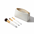 3-piece eye makeup brush set with white and gold handles in premium travel pouch